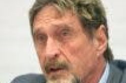 Software icon, McAfee, charged in cryptocurrency scam