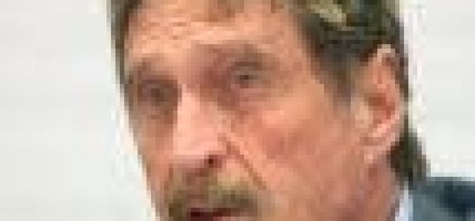 Software icon, McAfee, charged in cryptocurrency scam