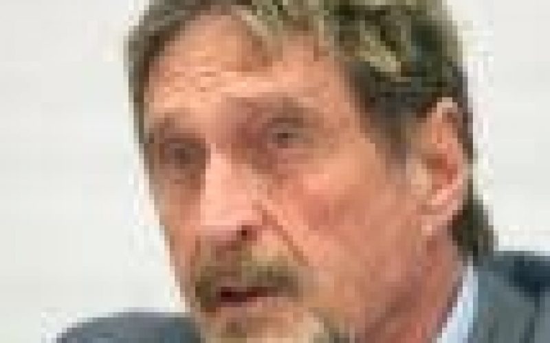 Software icon, McAfee, charged in cryptocurrency scam