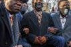 George Floyd’s family take a knee in Minneapolis