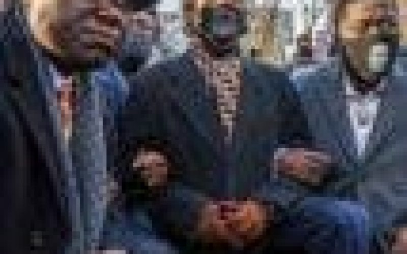 George Floyd’s family take a knee in Minneapolis