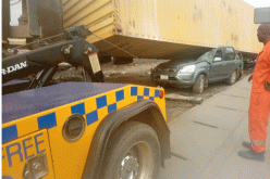 VIDEO/PHOTOS: No life lost as 40ft container, truck fall on 4 vehicles in Lagos