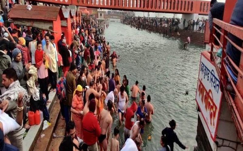 Millions gather in holy Indian town despite Covid-19 spike