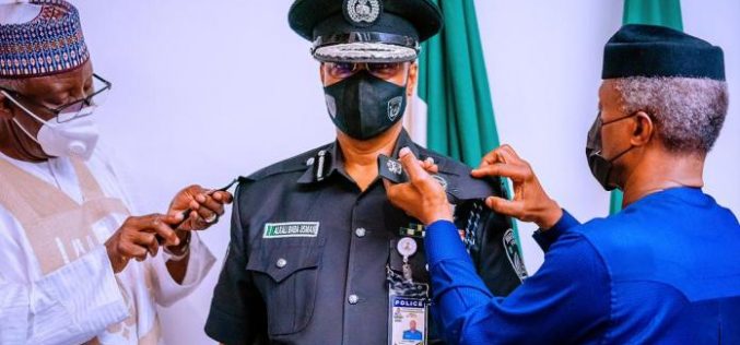 News in Photographs: Osinbajo Decorates IG Baba with New Rank