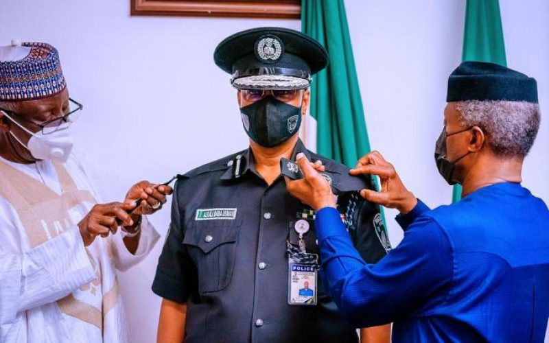 News in Photographs: Osinbajo Decorates IG Baba with New Rank