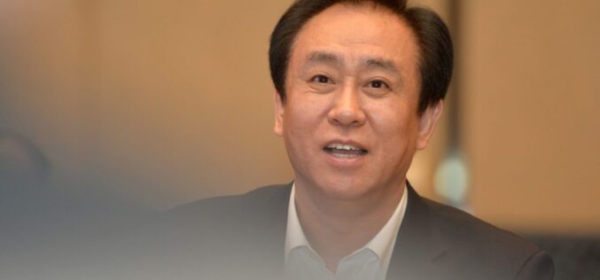 China jails Evergrande founder for life, fines firm over $2bn
