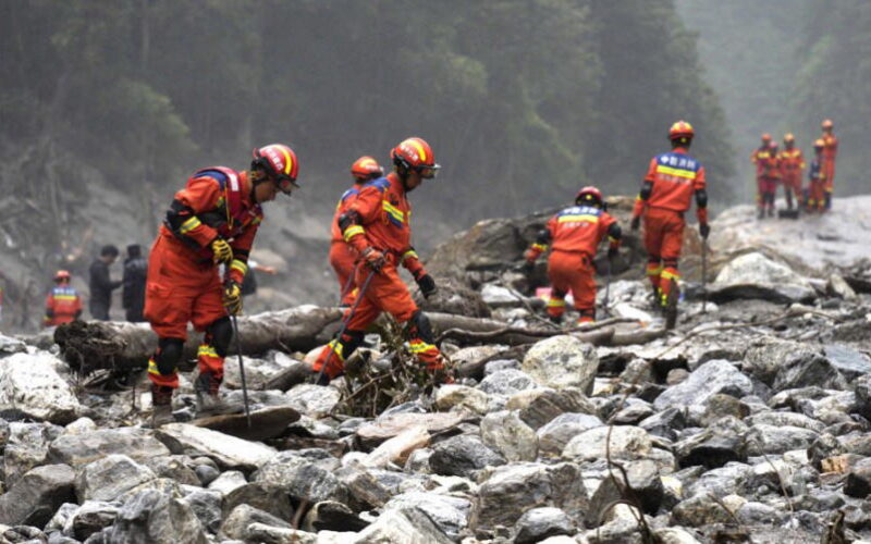 Rescuers dig into tunnel as missing toll from Nepal, China flood over 3,000