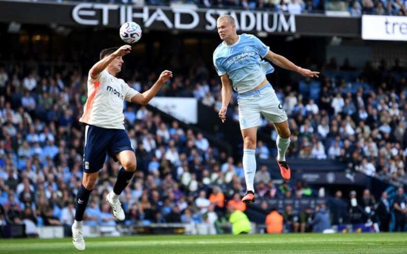 Haaland heads unconvincing Man City top of Premier League