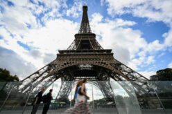 Eiffel Tower reopens after row over removing women staff