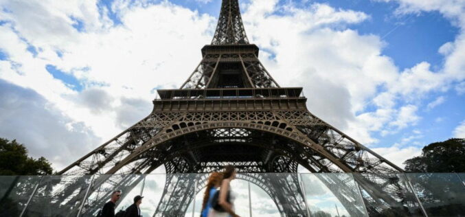 Eiffel Tower reopens after row over removing women staff