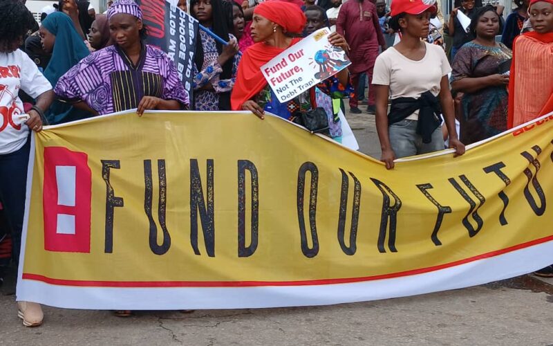 Photos: “Stop giving loans to Nigeria”, ActionAid, others protest Nigeria’s rising debt, borrowing